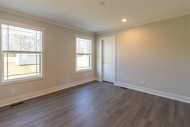 79 Bear Oak Dr, Dunlap, TN 37327 - empty room featuring plenty of natural light, crown molding, dark wood-style flooring, baseboards, and recessed lighting