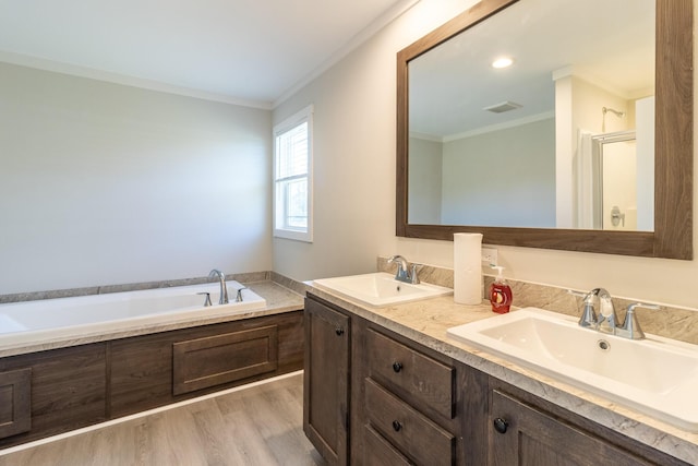 79 Bear Oak Dr, Dunlap, TN 37327 - full bath with ornamental molding, double vanity, a garden tub, and wood finished floors