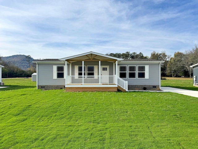 79 Bear Oak Dr, Dunlap, TN 37327 - manufactured / mobile home featuring crawl space, a porch, and a front lawn