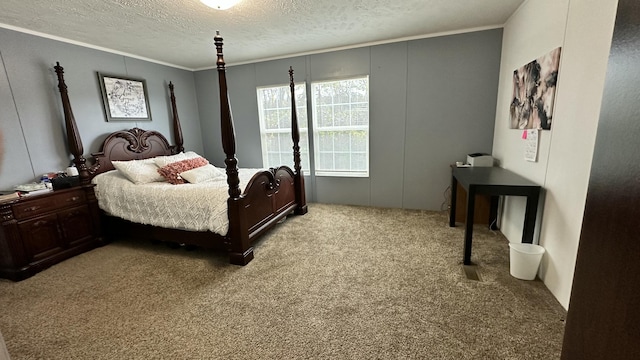 bedroom featuring ornamental molding, light carpet, and a textured ceiling