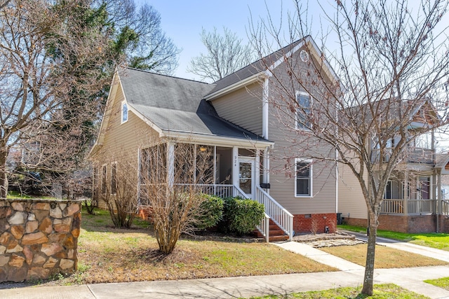 front of property featuring a sunroom