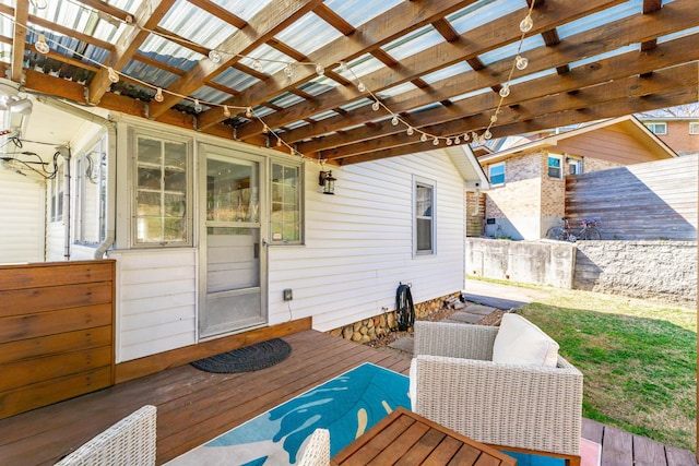 wooden terrace with fence and a pergola