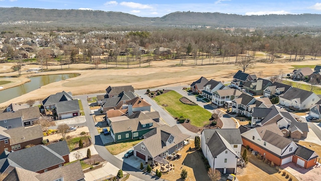 aerial view with a residential view and a water and mountain view