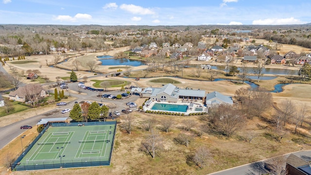 bird's eye view featuring a residential view and a water view