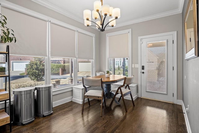 dining space with dark wood-style floors, ornamental molding, and baseboards