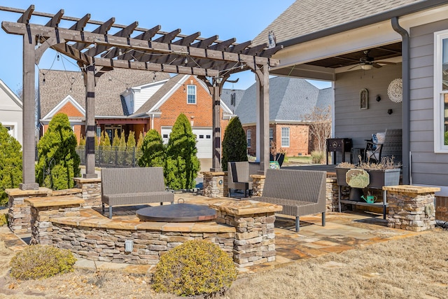 view of patio / terrace featuring ceiling fan, an outdoor hangout area, and a pergola