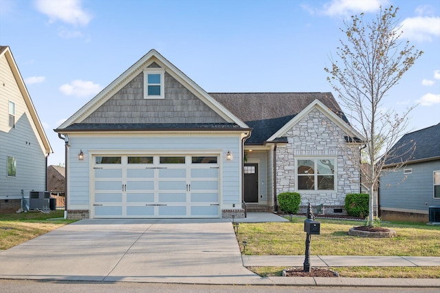view of front of house featuring driveway, central AC, stone siding, and a front lawn