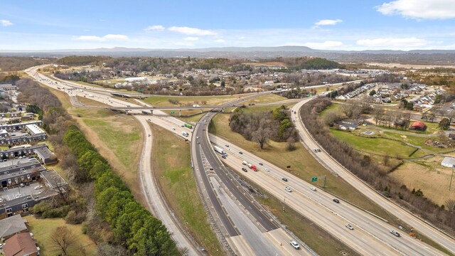 drone / aerial view featuring a mountain view