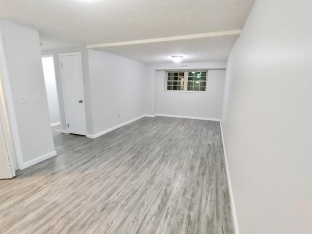 unfurnished room with light hardwood / wood-style flooring