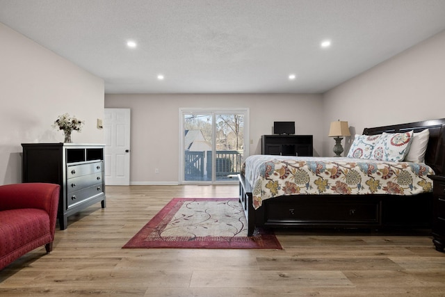 bedroom with access to outside, baseboards, wood finished floors, and recessed lighting