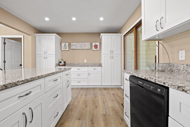 kitchen featuring dishwasher, recessed lighting, white cabinetry, and light wood-style floors