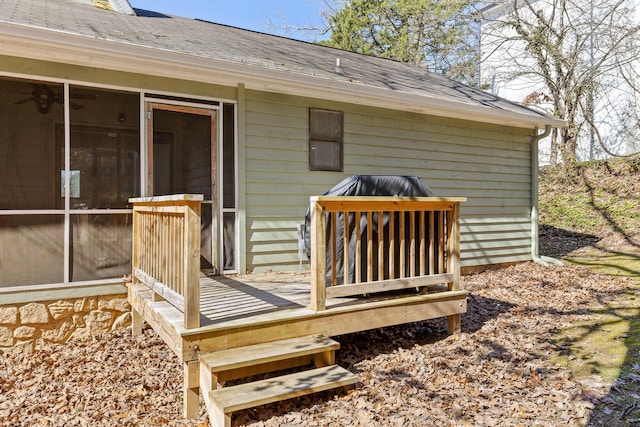 deck with a sunroom