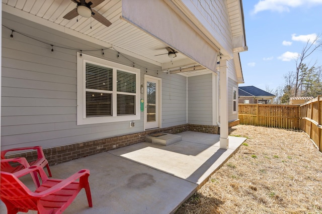 view of patio / terrace featuring ceiling fan, a fenced backyard, and entry steps