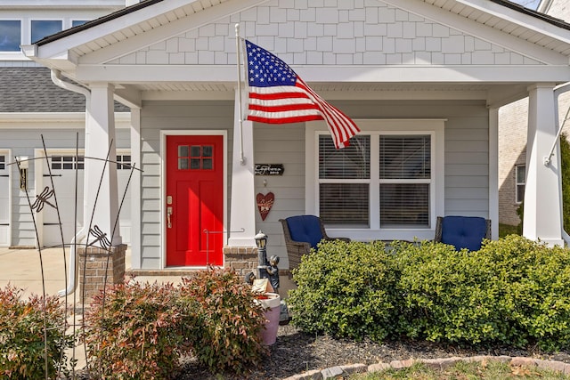 property entrance featuring a porch