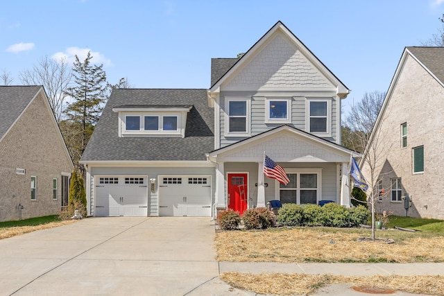 view of front facade featuring driveway and roof with shingles