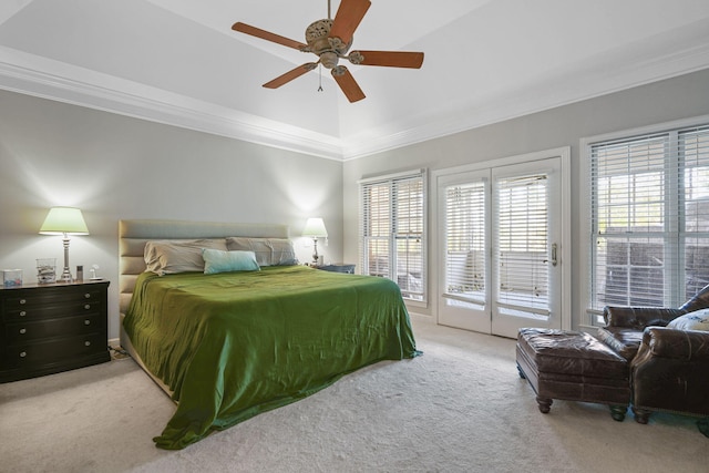 carpeted bedroom with access to exterior, crown molding, and a ceiling fan