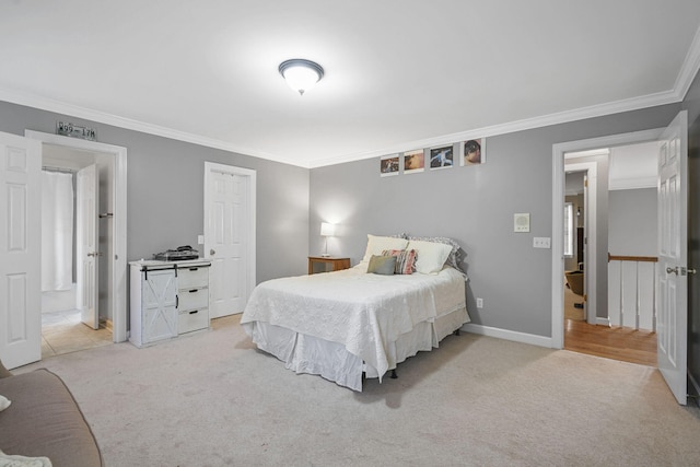 bedroom featuring light carpet, ornamental molding, and baseboards