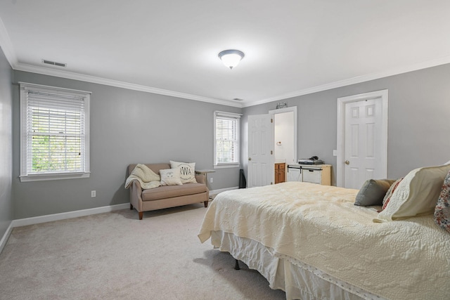 carpeted bedroom with visible vents, baseboards, and ornamental molding