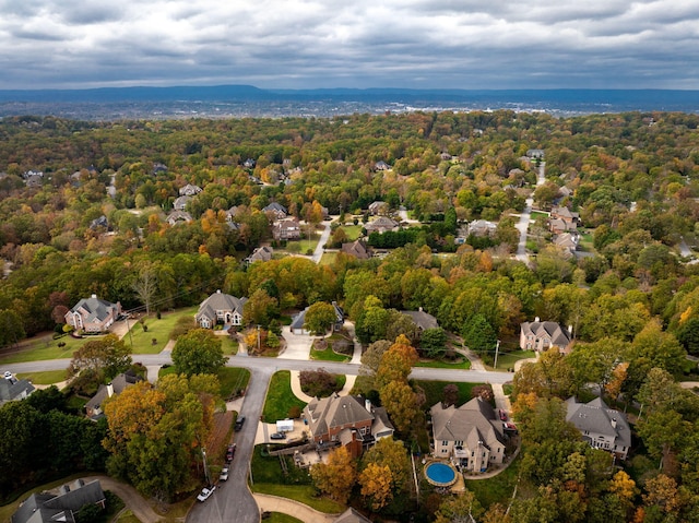 aerial view featuring a residential view and a view of trees