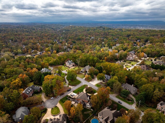 drone / aerial view with a view of trees