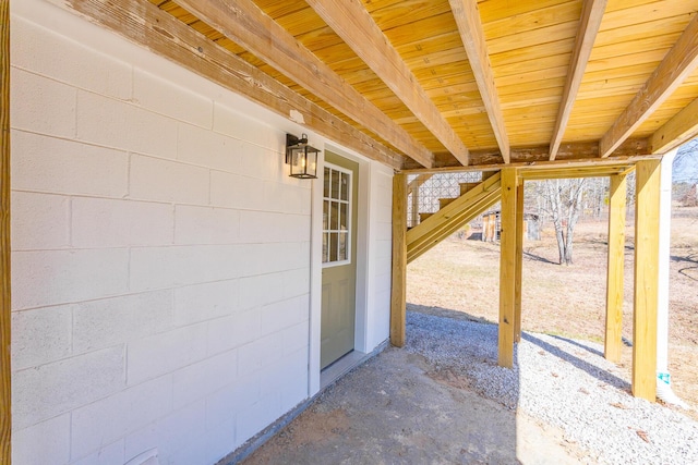 exterior space with concrete block siding