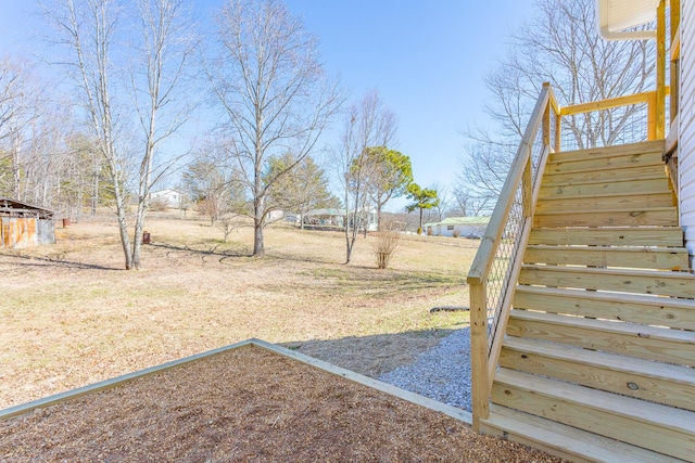 view of yard featuring stairway