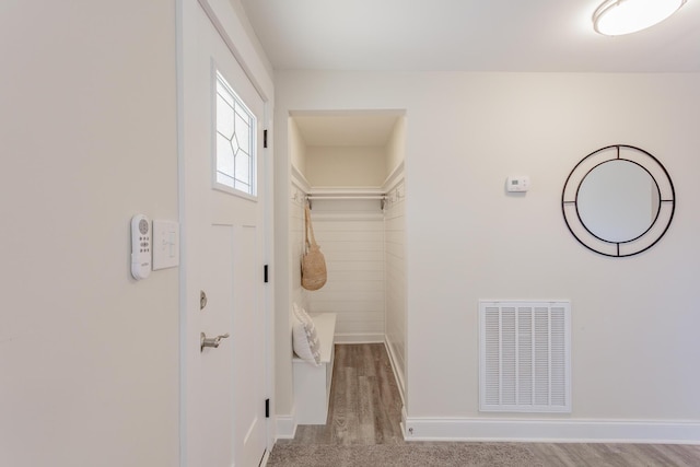 interior space with visible vents and baseboards