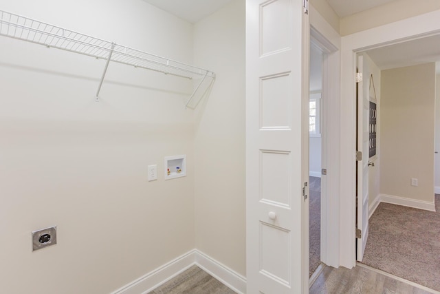 washroom featuring washer hookup, laundry area, hookup for an electric dryer, and baseboards