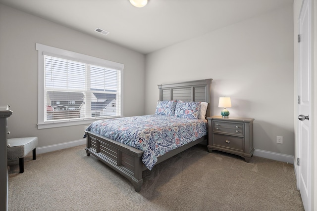 bedroom with light carpet