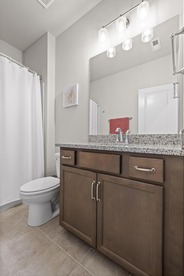 full bath with visible vents, vanity, tile patterned flooring, and toilet