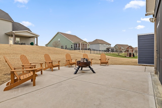 view of patio with an outdoor fire pit