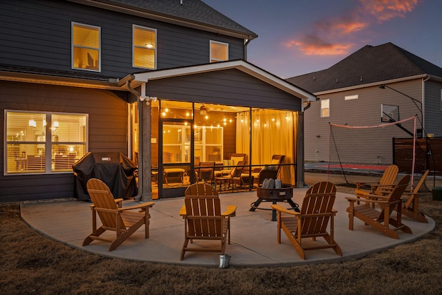 view of patio terrace at dusk