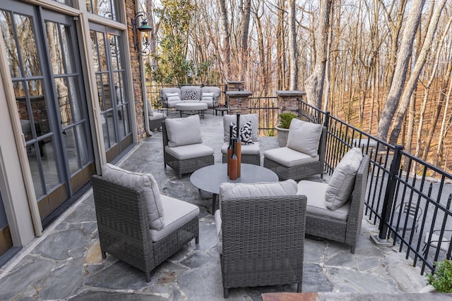 view of patio / terrace with an outdoor hangout area and french doors