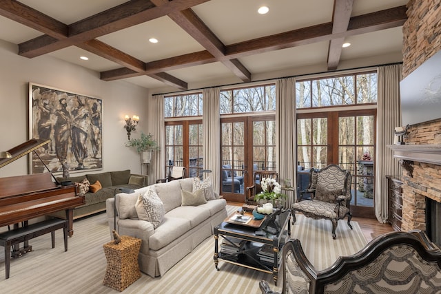 living room with beam ceiling, french doors, a fireplace, recessed lighting, and coffered ceiling