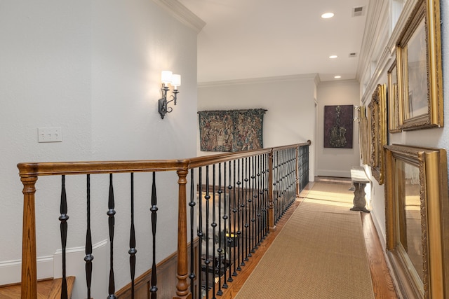 hall with recessed lighting, visible vents, and ornamental molding