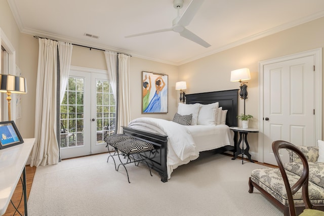 bedroom featuring access to exterior, french doors, crown molding, visible vents, and ceiling fan