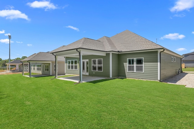 8904 Knolling Loop Unit 33, Ooltewah, TN 37363 - back of house featuring a patio area, a yard, and roof with shingles