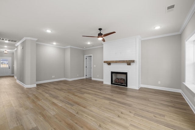 8904 Knolling Loop Unit 33, Ooltewah, TN 37363 - unfurnished living room with ceiling fan, recessed lighting, ornamental molding, light wood-style flooring, and a large fireplace