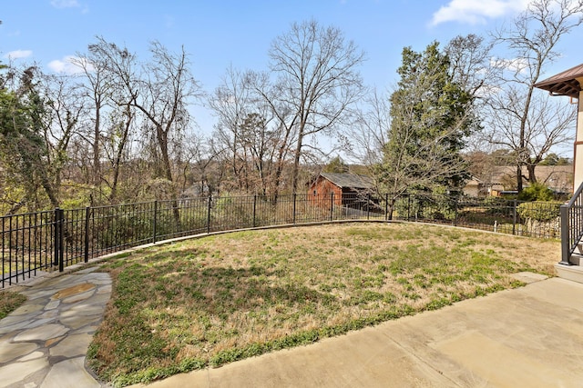 view of yard featuring a patio area and a fenced backyard