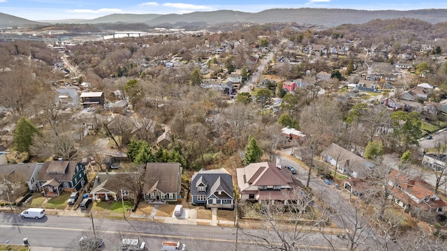 birds eye view of property with a residential view and a mountain view