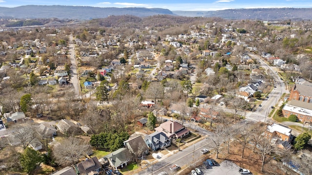 birds eye view of property with a residential view and a mountain view