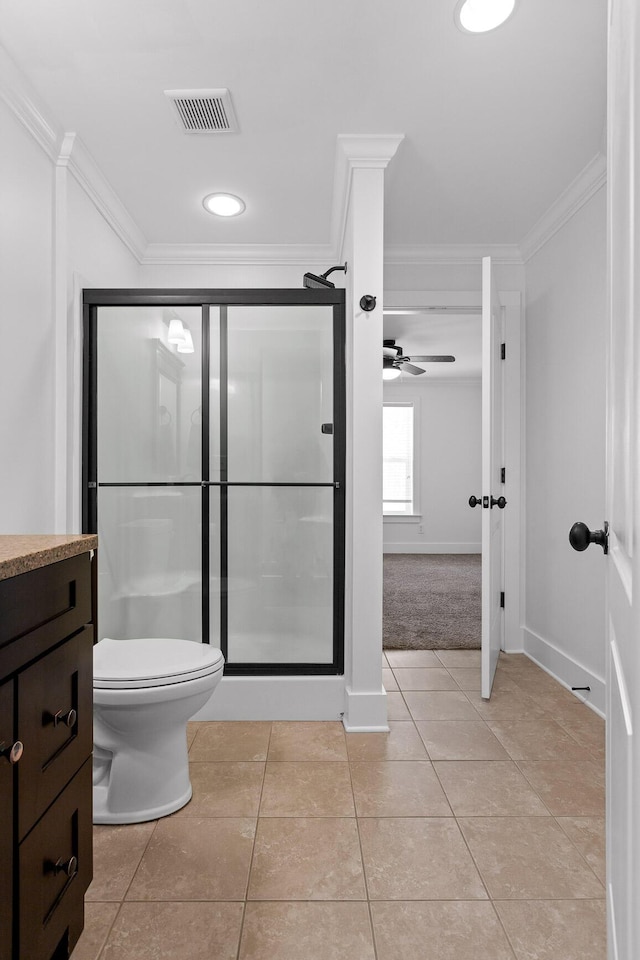 bathroom with a stall shower, visible vents, crown molding, and tile patterned floors