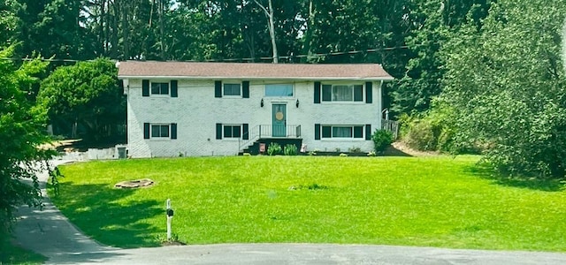 25 Carolyn Ln, Rossville, GA 30741 - raised ranch with brick siding and a front lawn