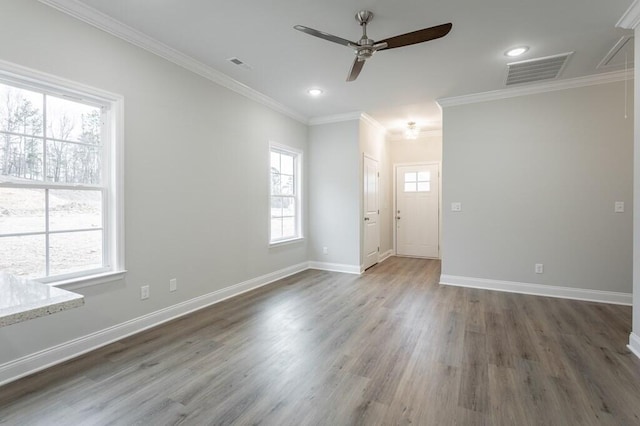 186 Andros Dr Unit 20D, Dalton, GA 30721 - spare room featuring dark hardwood / wood-style flooring, ceiling fan, and crown molding
