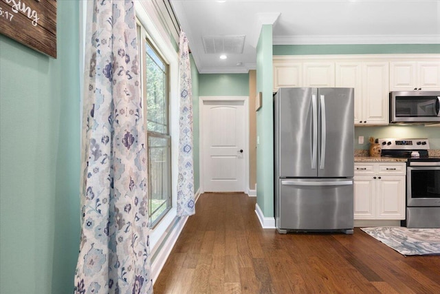 55 E Acorn Dr, Rock Spring, GA 30739 - kitchen with stainless steel appliances, crown molding, dark wood-style flooring, white cabinets, and baseboards