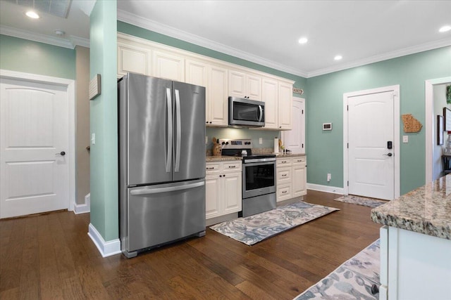 55 E Acorn Dr, Rock Spring, GA 30739 - kitchen featuring stainless steel appliances, baseboards, dark wood-type flooring, crown molding, and light stone counters