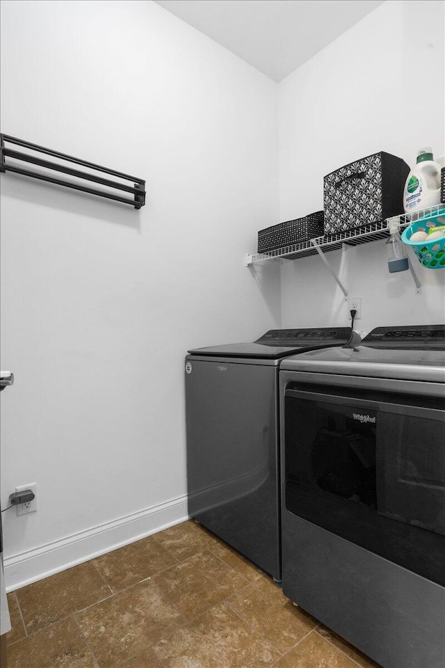 55 E Acorn Dr, Rock Spring, GA 30739 - laundry area featuring separate washer and dryer, baseboards, and stone finish flooring