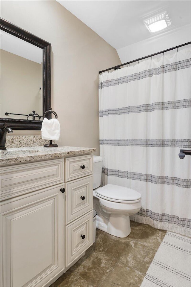 55 E Acorn Dr, Rock Spring, GA 30739 - bathroom featuring toilet, vanity, lofted ceiling, and curtained shower