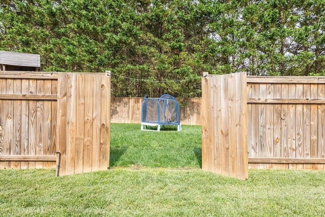 55 E Acorn Dr, Rock Spring, GA 30739 - view of yard with a trampoline