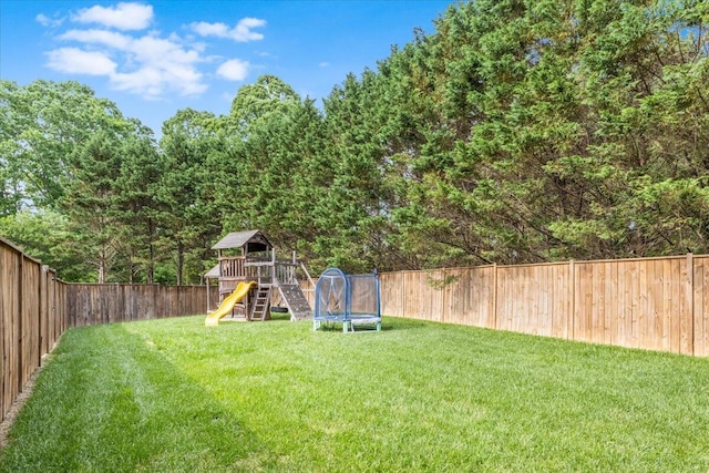 55 E Acorn Dr, Rock Spring, GA 30739 - view of yard featuring a trampoline and a playground